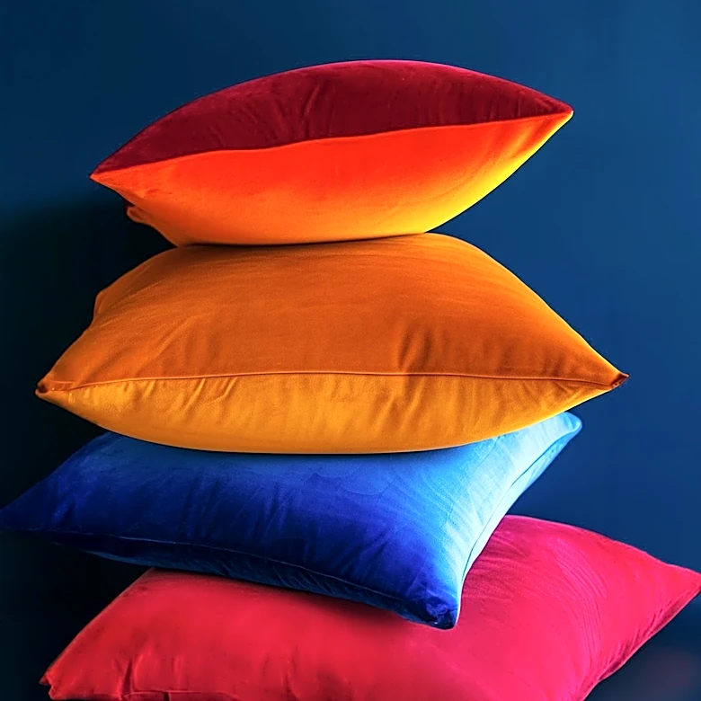 Enhancing Home Interiors with Rust Red Pillows for Warmth and Texture