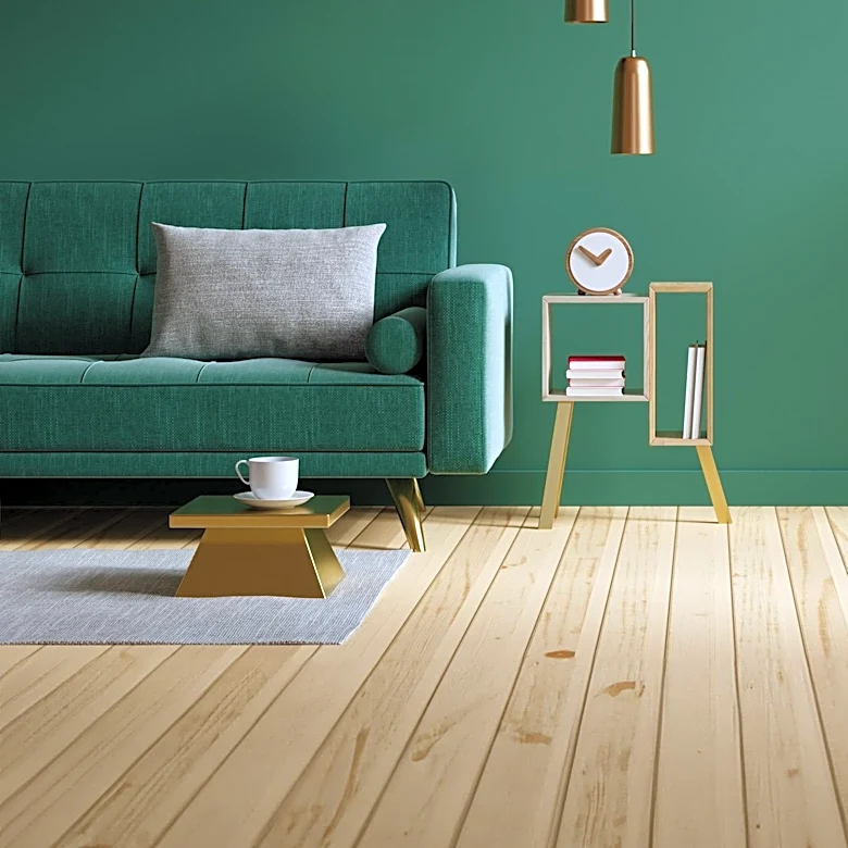 Dark Green Walls Transform Living Room into Cozy Space