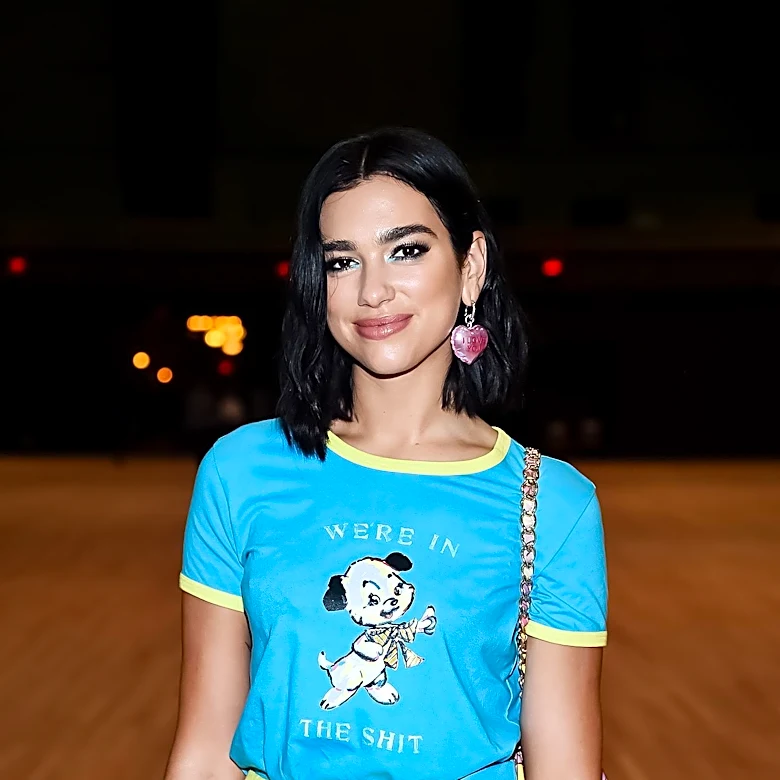 Dua Lipa Showcases High-Low Fashion with Birkin and Yankees Cap in New York
