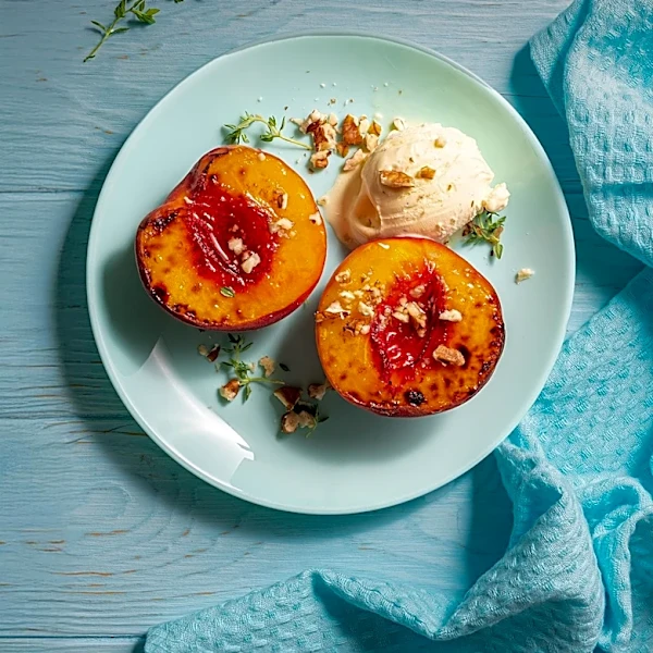 Thomasina Miers Shares Spanish Summer Recipes with Grilled Prawns and Baked Peaches