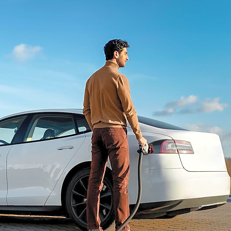 Tesla's Future Hinges on Robotaxi and Humanoid Robot Projects Amidst EV Market Competition