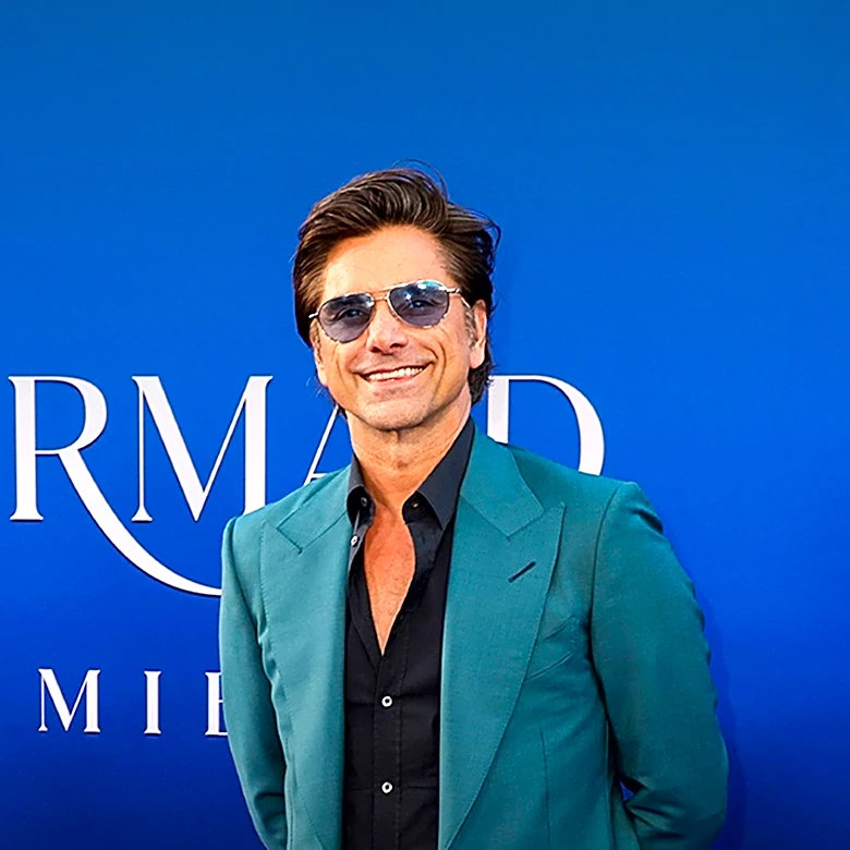 John Stamos Discusses Role in 'The Hunting Wives' and Reflects on Past Experiences