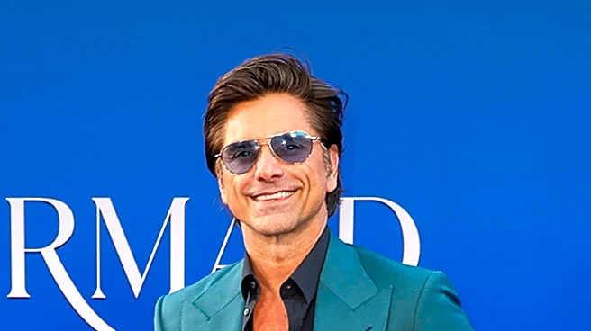 John Stamos Discusses Role in 'The Hunting Wives' and Reflects on Past Experiences