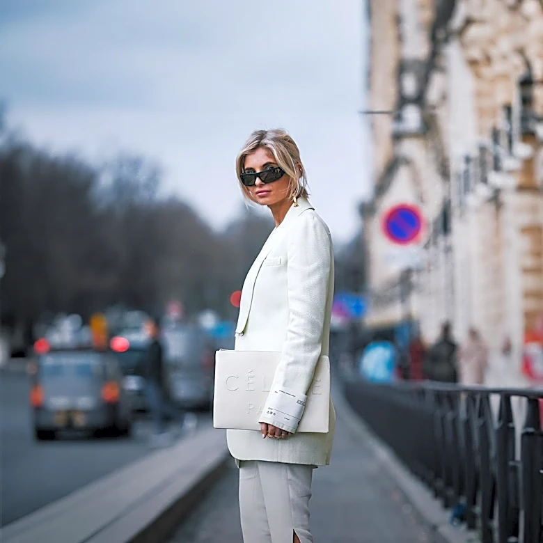 Y2K-Inspired Long Shorts Paired with Chic Accessories for Summer Style