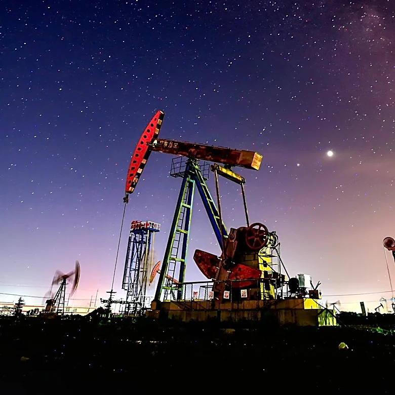 Chevron and Exxon Report Record Profits Amid Iran Conflict, Impacting Global Fuel Prices