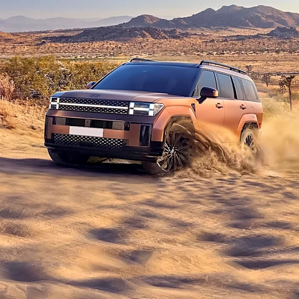 Rivian Faces Stock Price Drop Amid Positive Financial News and Tariff Lawsuit