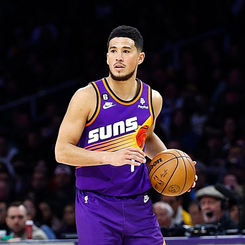 Devin Booker's Performance and Efficiency Under Scrutiny Amid Superstar Debate