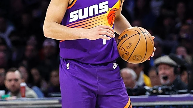 Devin Booker's Performance and Efficiency Under Scrutiny Amid Superstar Debate