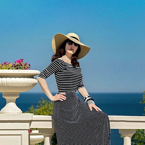 Joan Collins Embraces Zebra Print for Effortless Resort Wear in St. Tropez