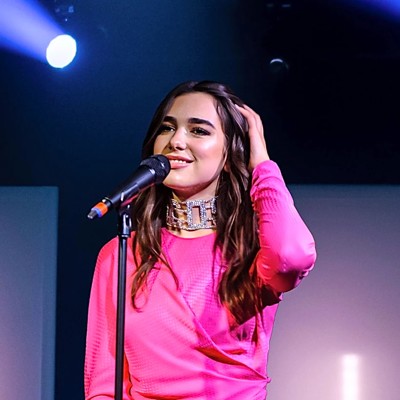 Dua Lipa Embraces Sportif Trend at Sunny Hill Festival with Fashion Forward Styles