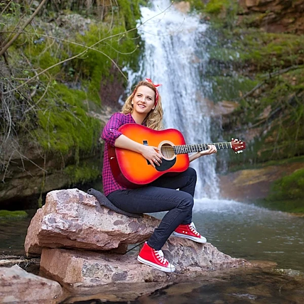 Utah Teacher Overcomes Surgery to Inspire Through Music and Family History