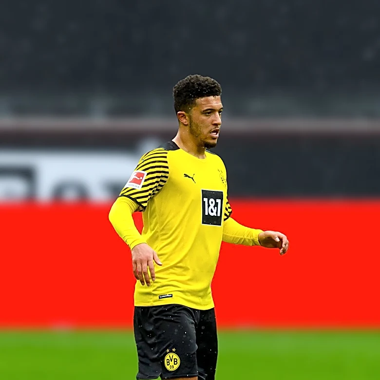 Jadon Sancho's Visit to Flixton FC Sparks Speculation Amid Transfer Uncertainty