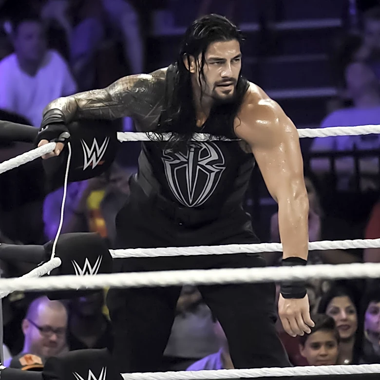 Roman Reigns' Dominance in WWE Faces New Challenge from Oba Femi