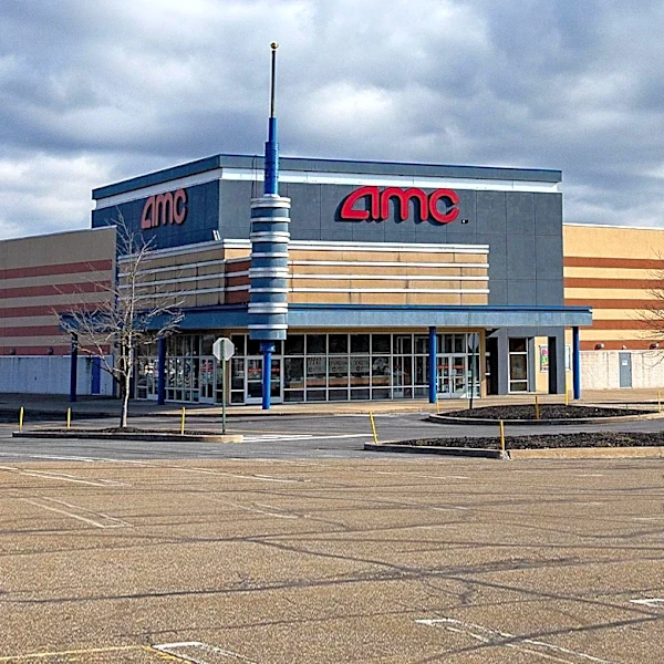 GameStop Faces Stock Decline Amid Debt Exchange, AMC Surges on Box Office Success