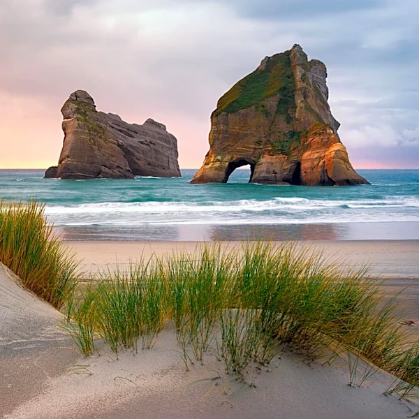 Wharariki Beach in New Zealand Becomes a Viral Travel Destination Due to Windows 10 Lock Screen