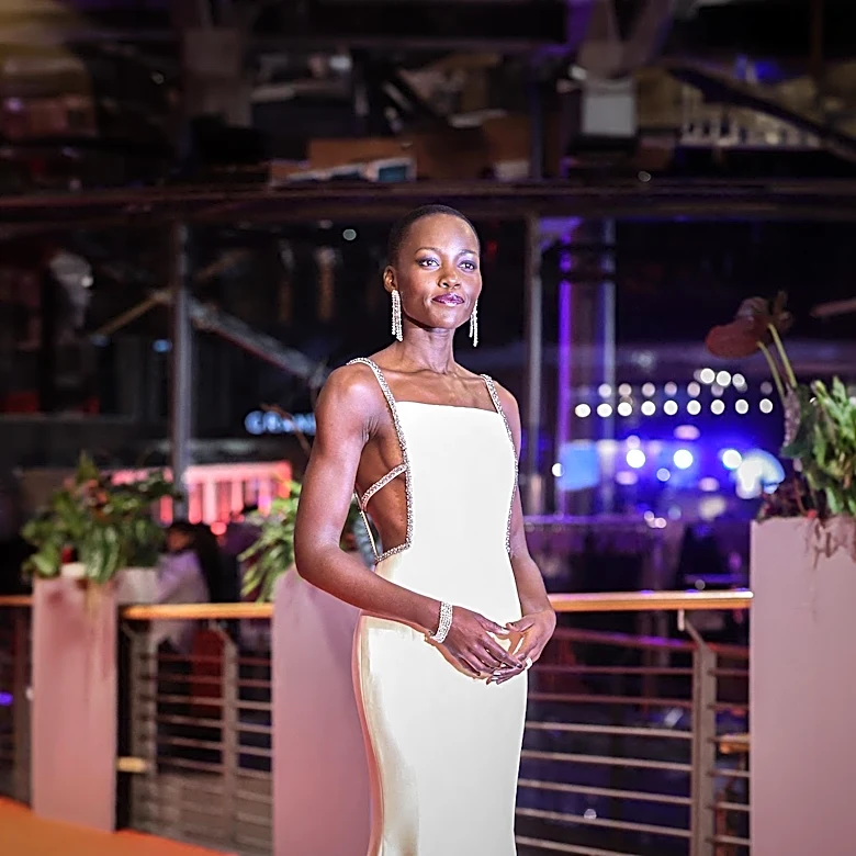 Charlize Theron and Lupita Nyong'o Make Bold Fashion Statements at 'The Odyssey' Premiere