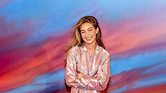 Gigi Hadid Sports New Balance Sneakers with Trendy Summer Wardrobe