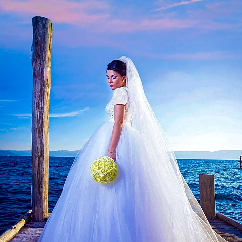 Dolores Catania Sparks Controversy with Wedding Dress Choice