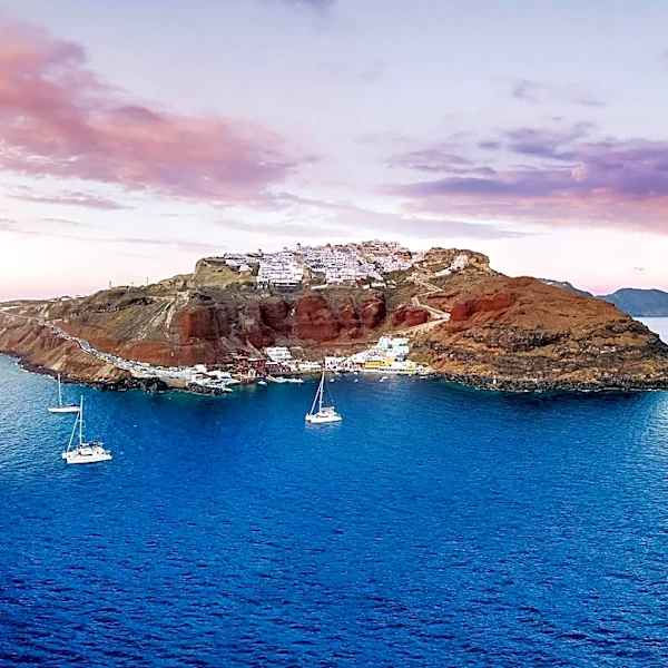 Santorini's Unique Beaches: Volcanic Sands and Dramatic Cliffs Offer Distinctive Experiences