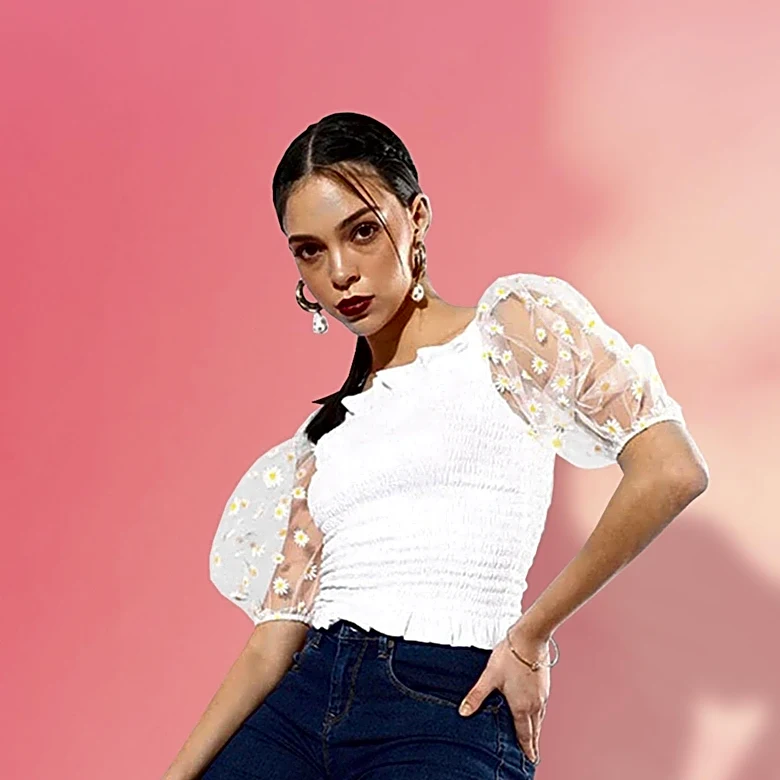 Aritzia's Chocolate Brown Smocked Top Gains Popularity for Versatile Style