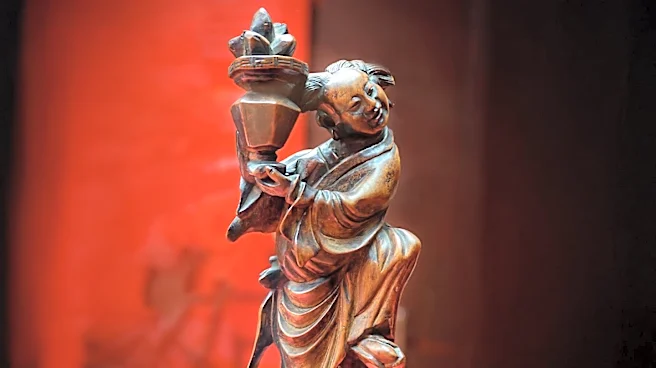 Jiang Miao's Art Exhibition Explores Mindfulness Through Monumental Wood Carvings