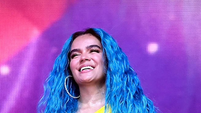 Karol G Releases New Album Featuring Bruno Mars and Drake, Showcasing Emotional Depth