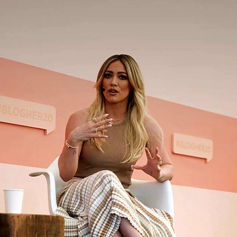 Hilary Duff's Fashion Statement: Lacy Doen Micro Shorts and Cashmere Polo Top