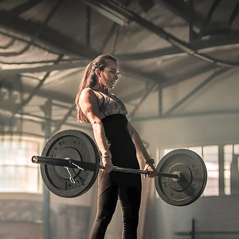 Wellness Coach Advocates Weight Lifting for Mental Resilience and Confidence