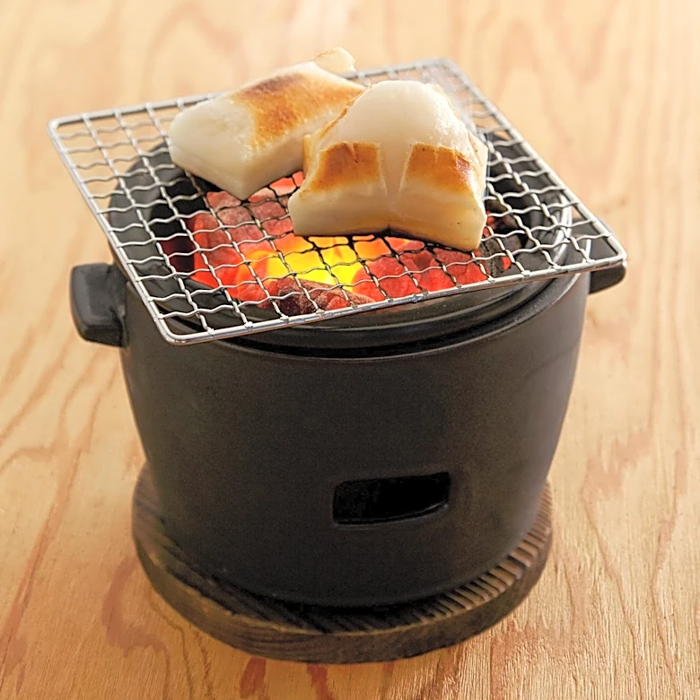 Weber's Smart Ring Transforms Charcoal Grills into Smokers