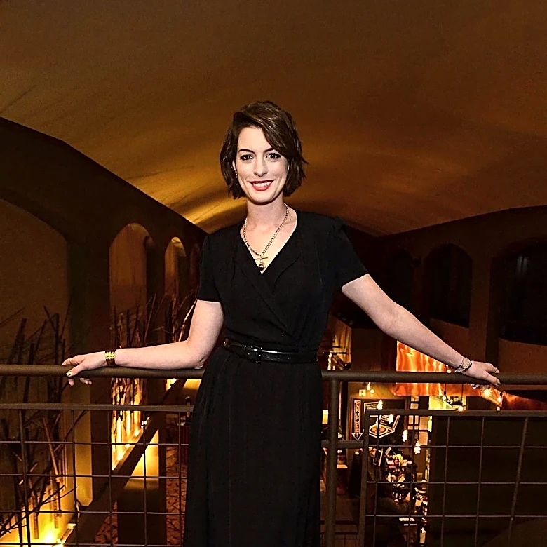 Anne Hathaway Showcases Maternity Style at Film Premiere
