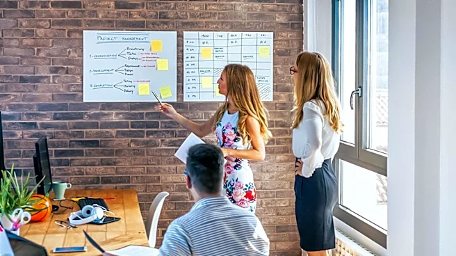 Charles Schwab Emphasizes In-Office Collaboration and Career Development for Finance Professionals