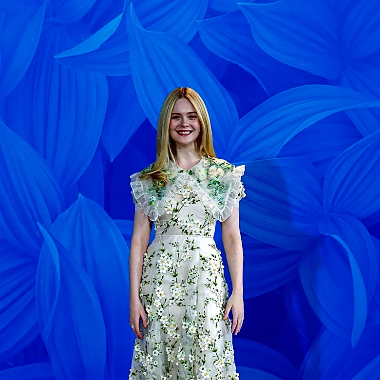 Elle Fanning Showcases Vintage Miu Miu at Hamptons Event, Continuing Long-Standing Relationship with Fashion House