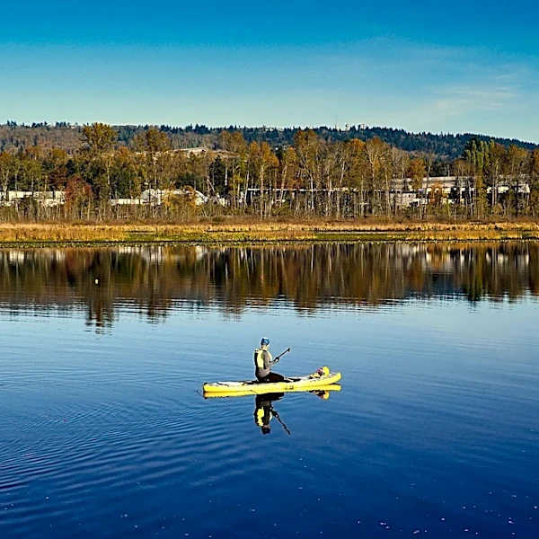 University of Richmond Alumni Engage in Challenging Yet Relaxing Paddleboard Yoga on James River