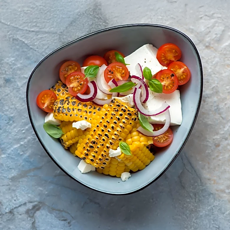 Naomi Nachman and Adeena Sussman Collaborate on Israeli-Inspired Harissa Fish and Summer Corn Salad