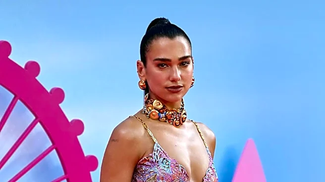 Dua Lipa Showcases Jumbo Polka Dot Manicure, Extending Summer Nail Trends