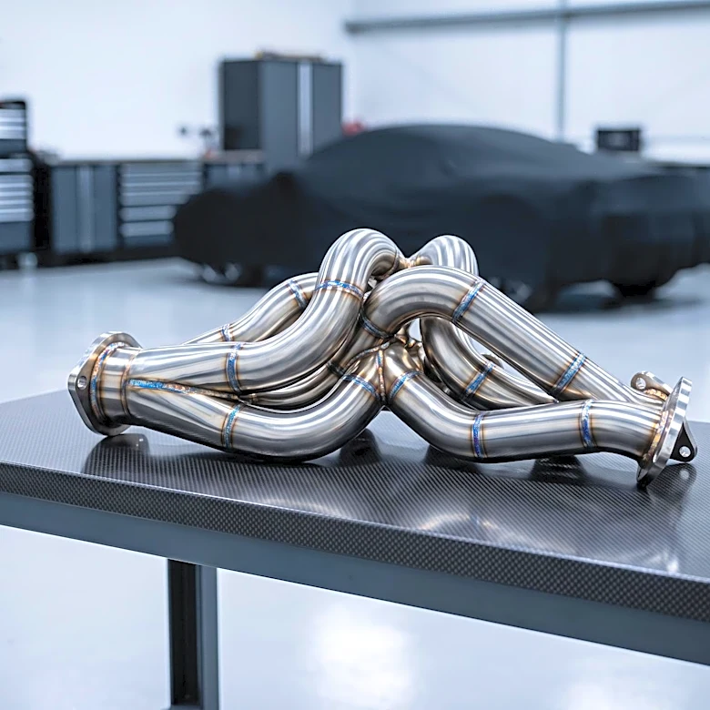 YouTuber Ratarossa Restores Rusty Ferrari 512 BBi Exhaust System, Saving Significant Costs