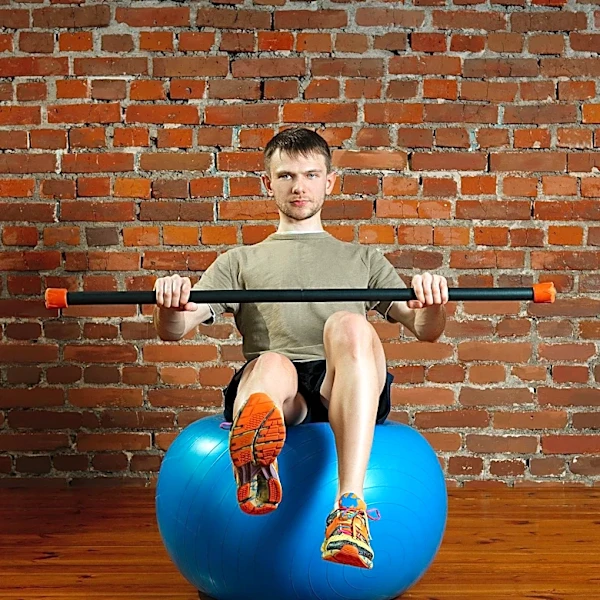 Trainer Recommends Stability Ball Dead Bug for Core Engagement Before Deadlifts