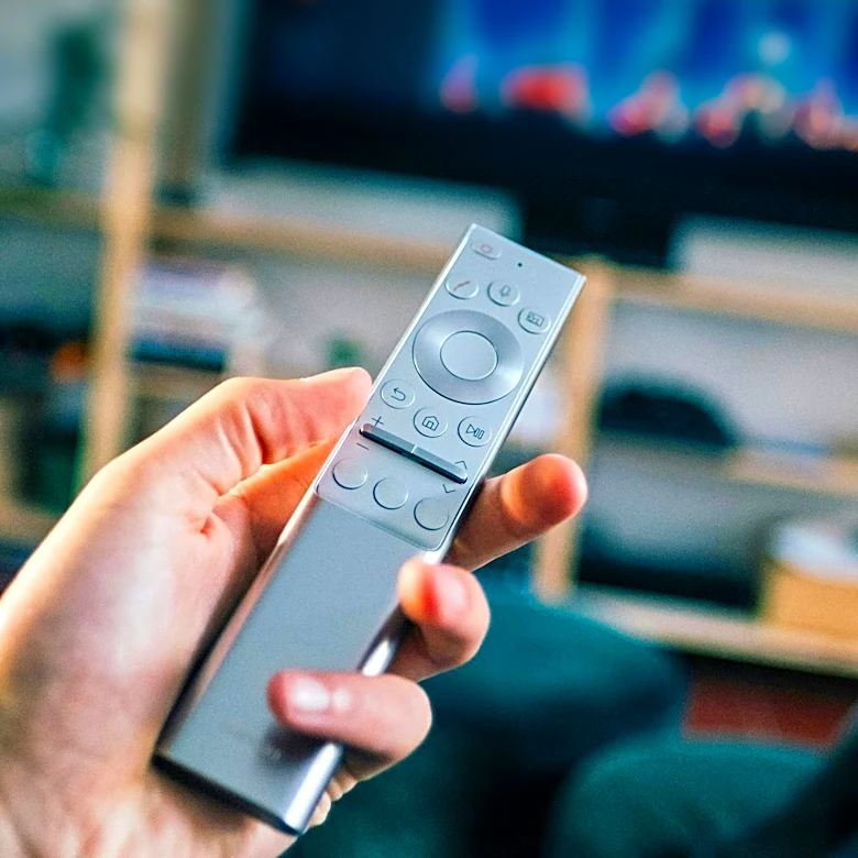 The Evolution and Impact of the TV Remote Control on American Society and Television Programming