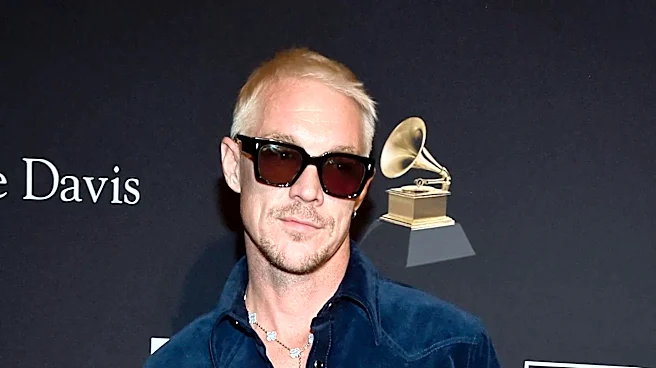 DJ Diplo and Chris Rock Trek Miles Through Mud to Escape Burning Man Festival