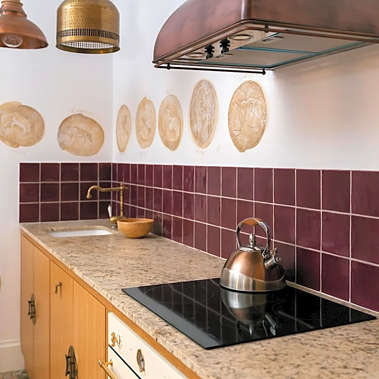 Designer Claire Thomas Renovates 1929 Spanish Colonial Kitchen with Art Deco Influence