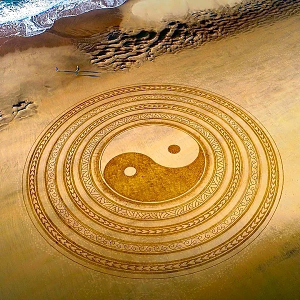 California Sand Artist Brighton Denevan Creates Intricate Beach Masterpieces Overnight