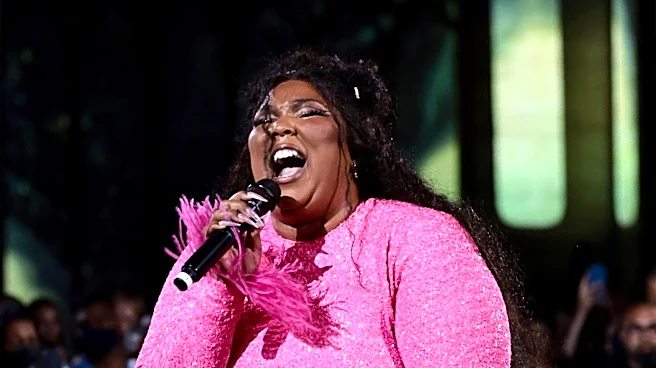 Lizzo's Homecoming Outfit in Houston Features Plunging Micro Minidress and Chanel Accessory