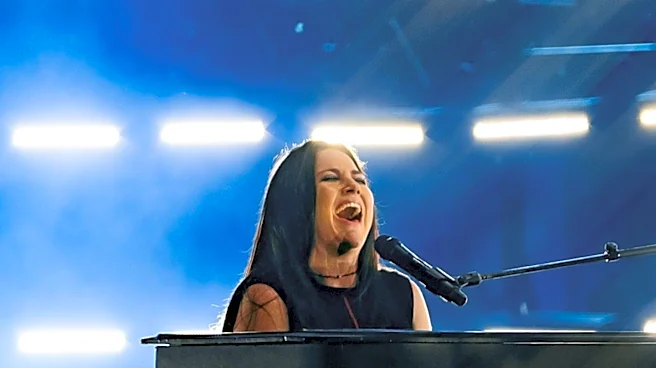 Courtney LaPlante's Performance with Evanescence and Poppy Sparks Debate on Modern Metal Concert Energy