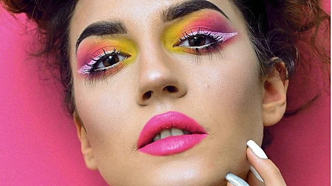 Olivia Dean Embraces 80s Beauty Trends, Contrasting Modern Minimalism