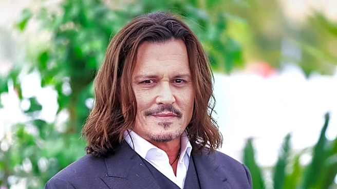 Johnny Depp Bites Decorative Plant at Las Vegas Event