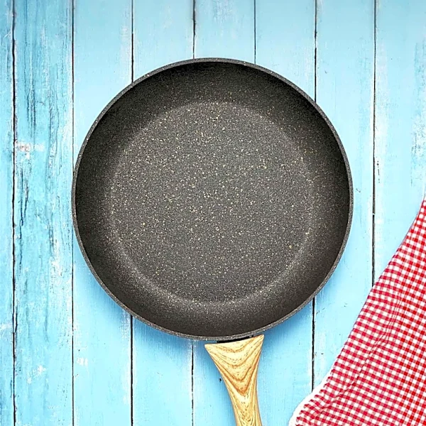 DIY Project Transforms Old Frying Pans into Rustic Farmhouse Patio Decor