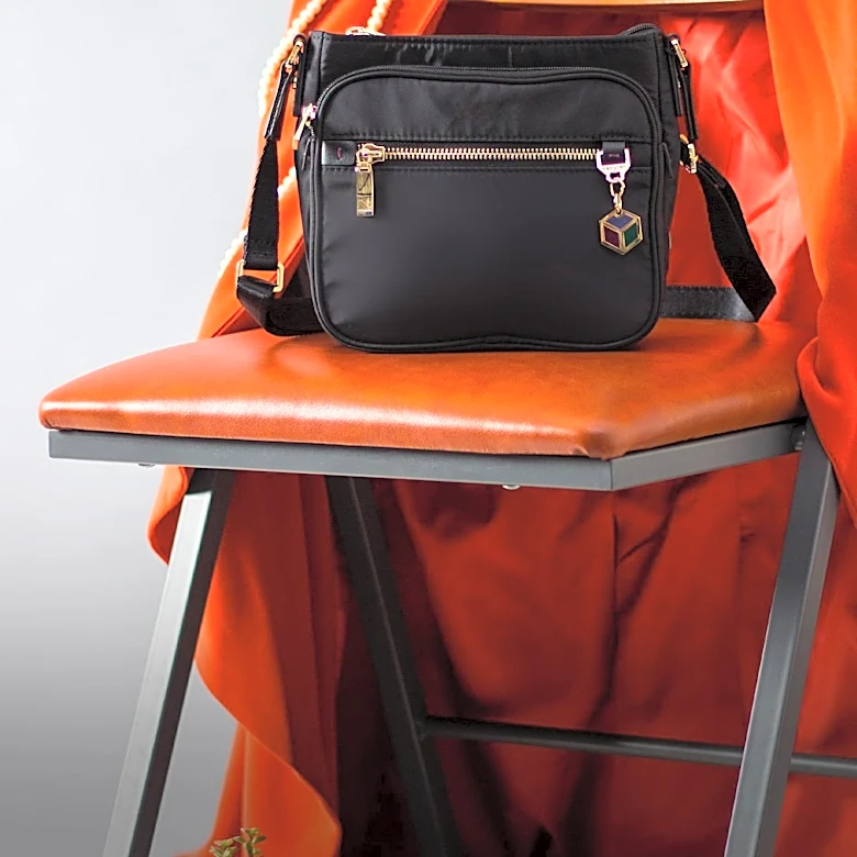 T.J. Maxx Offers Designer Juicy Couture Bag with Dog Charm at Discounted Price