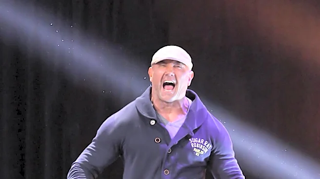 Dave Bautista Honors Deceased WWE Superfan 'Sign Guy' Rick Achberger