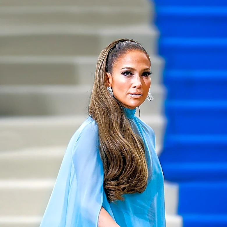 Jennifer Lopez Expresses Annoyance as Umbrella Confiscated at Rainy Paris Fashion Week Event