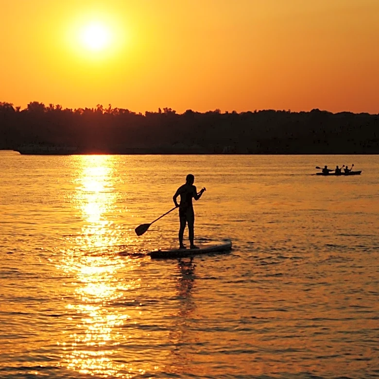 Kate Vallas Pioneers Paddleboard Yoga in Jacksonville Since 2009